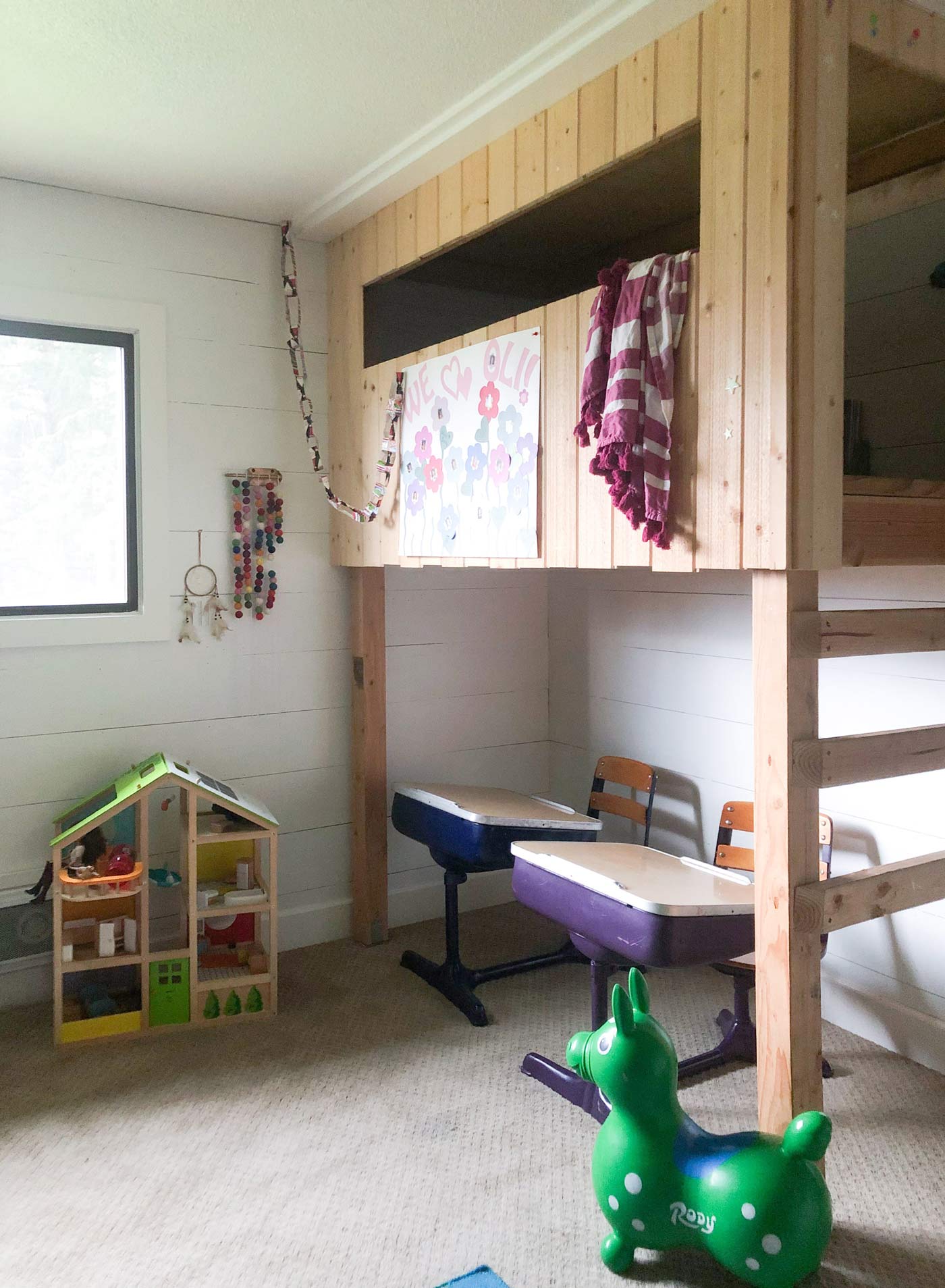 Before-kids-room-treehouse-with-vintage-desks-underneath