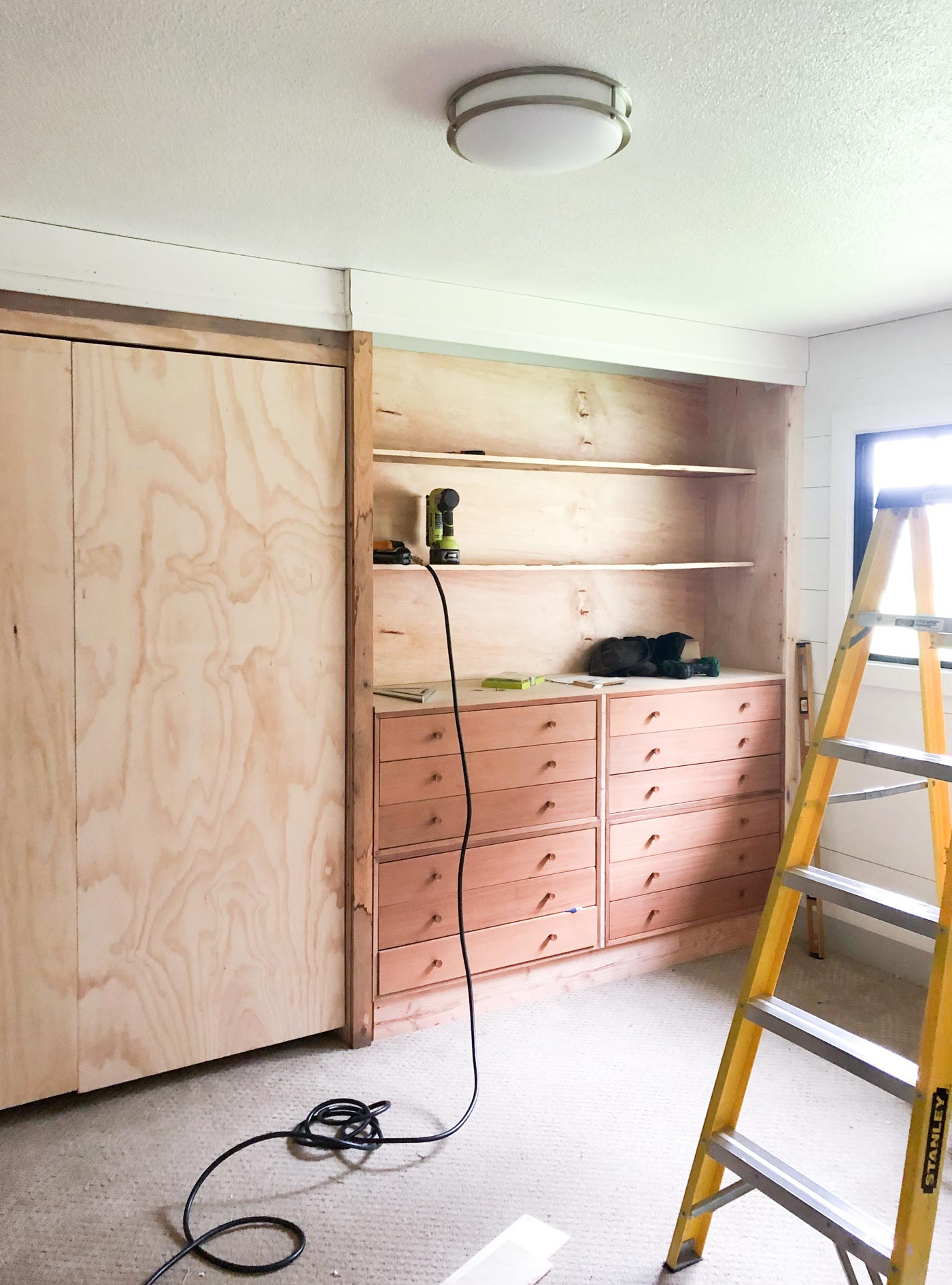 DIY-builtins-dressers-and-shelves-with-murphy-bed