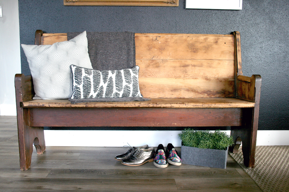 bench-shoes-black-wall