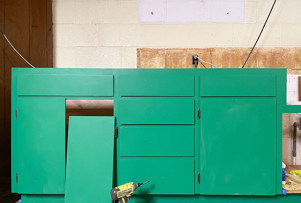 Newly painted green cabinets