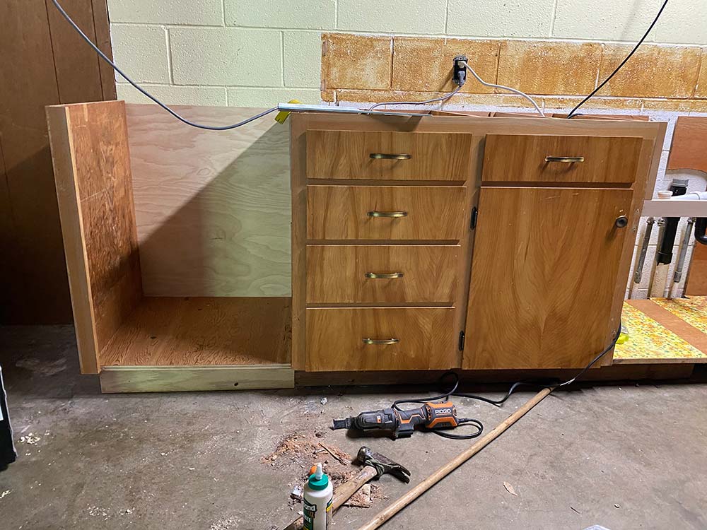The new secret cabinet addition on the end of the existing cabinetry