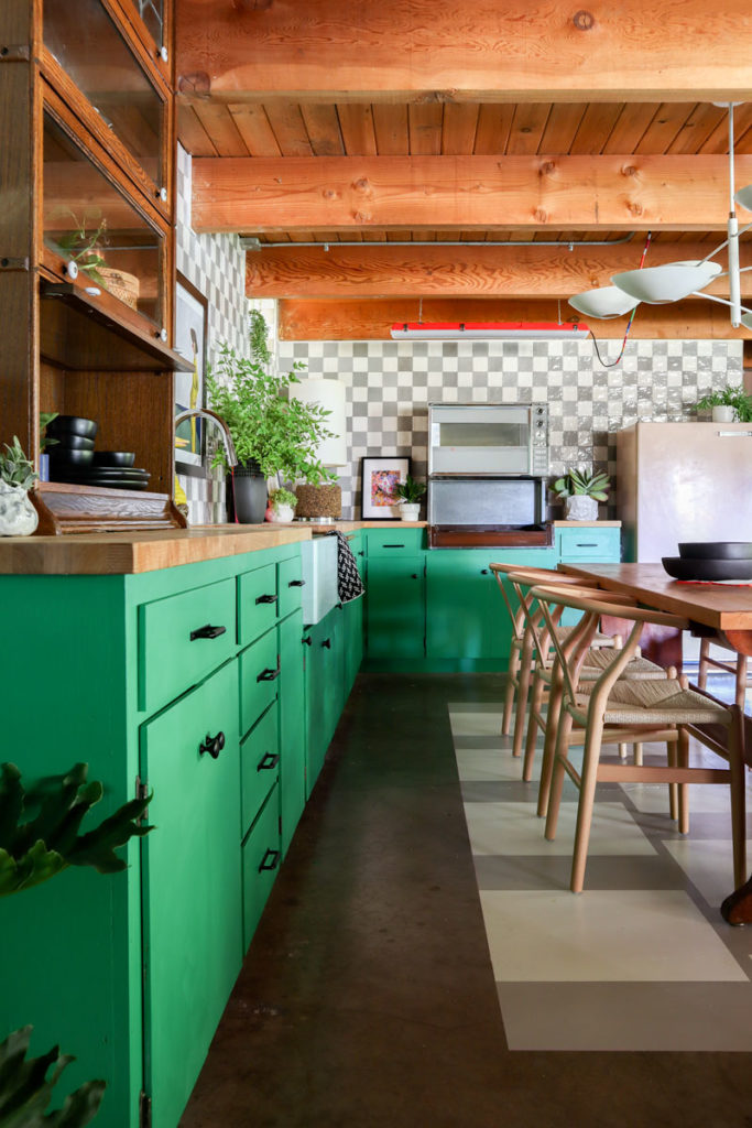 Banyan Bridges basement kitchen reveal for the 2021 ORC with green cabinets, tile, refinished table, and lighting